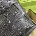 Gucci-GG-Embossed-Backpack-Black.jpeg