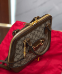 Gucci-GG-Supreme-Canvas-Top-Handle-Bag-Brown.png