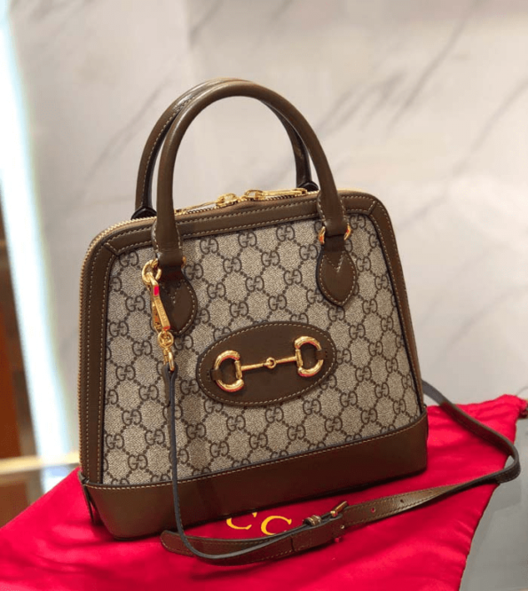 Gucci-GG-Supreme-Canvas-Top-Handle-Bag-Brown.png