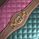 Gucci-Laminated-Leather-Small-Shoulder-Bag-Pink-And-Blue.png