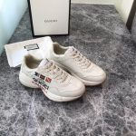 Gucci-Rhyton-Logo-Print-Leather-Trainers-White.jpg