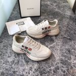 Gucci-Rhyton-Logo-Print-Leather-Trainers-White.jpg