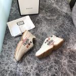 Gucci-Rhyton-Logo-Print-Leather-Trainers-White.jpg