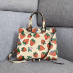 Gucci-Zumi-Straw-Berry-Print-Small-Top-Handle-Bag.png