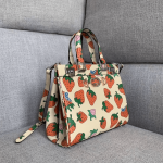 Gucci-Zumi-Straw-Berry-Print-Small-Top-Handle-Bag.png