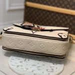 LV-Monogram-Empreinte-Crafty-Pochette-Metis-8.jpg