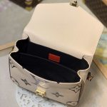 LV-Monogram-Empreinte-Crafty-Pochette-Metis-8.jpg