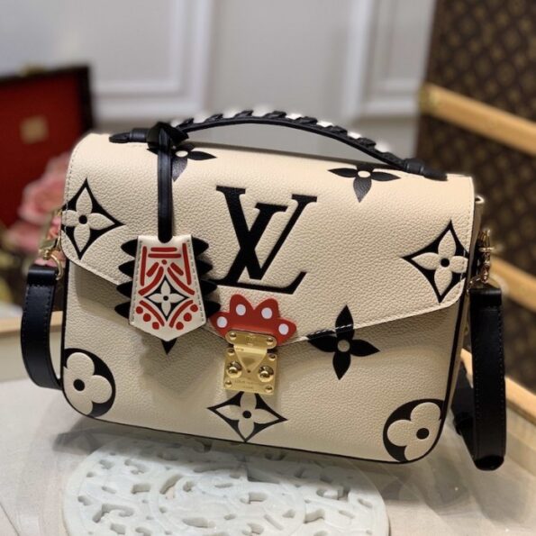 LV-Monogram-Empreinte-Crafty-Pochette-Metis-8.jpg