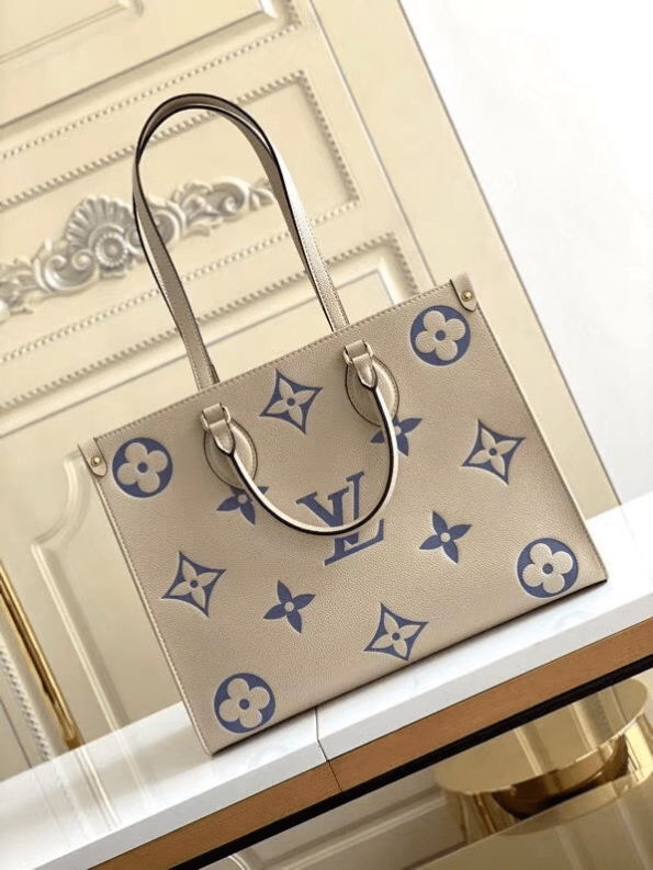 Louis-Vuitton-ONTHEGO-MM-Cream-and-Blue-1.png