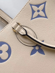 Louis-Vuitton-ONTHEGO-MM-Cream-and-Blue.png