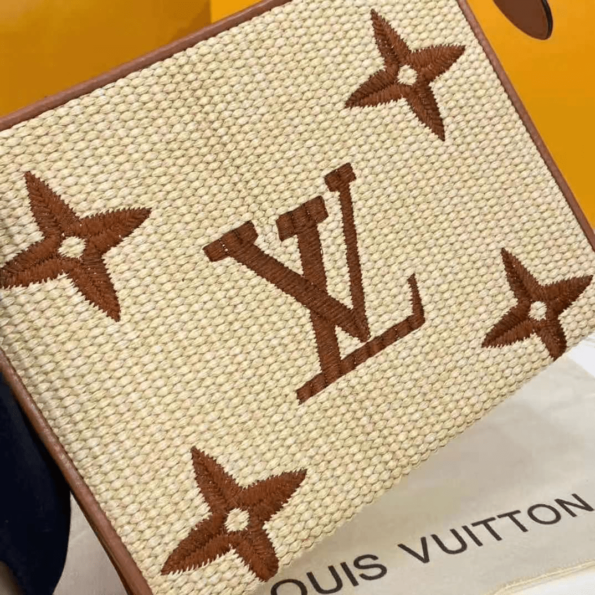 Louis-Vuitton-POCHETTE-VOYAGE-MM-Brown-3.png