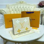 Louis-Vuitton-POCHETTE-VOYAGE-MM-Cream-Saffron.jpg