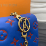 Louis-Vuitton-Pochette-Coussin-Blue-Red.png