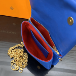 Louis-Vuitton-Pochette-Coussin-Blue-Red.png