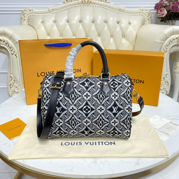 Louis-Vuitton-Since-1854-Speedy-Bandouliere-25-Gray-1.png