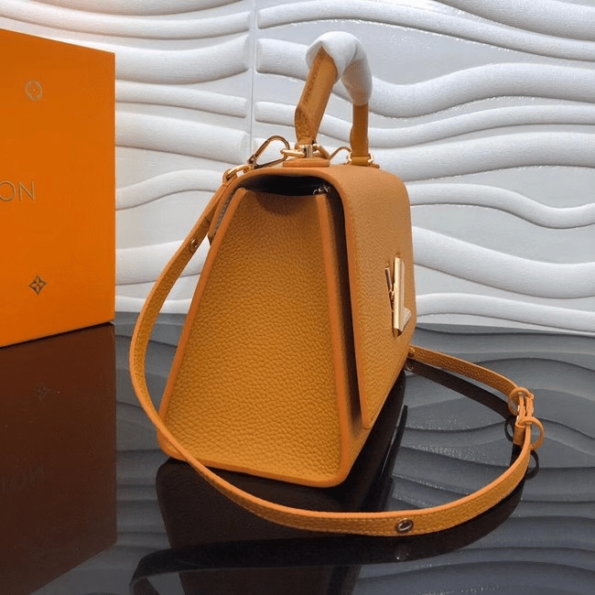 Louis-vuitton-Twist-One-Handle-MM-yellow-1.png