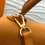 Louis-vuitton-Twist-One-Handle-MM-yellow.png